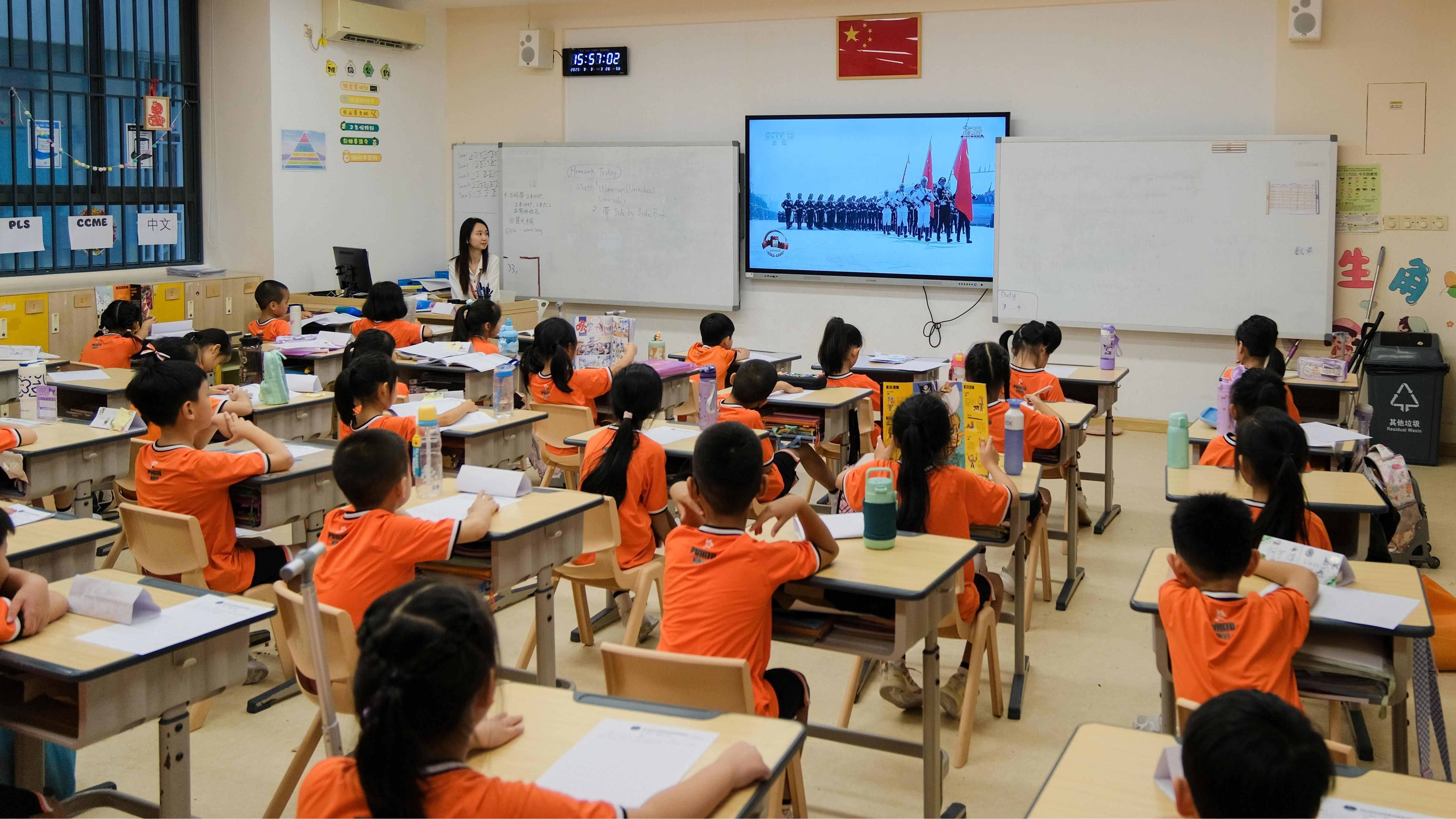 Honouring the Past, Aspiring for the Future - Pui Kiu Xinyi School Students and Staff Watch the Grand Military Parade